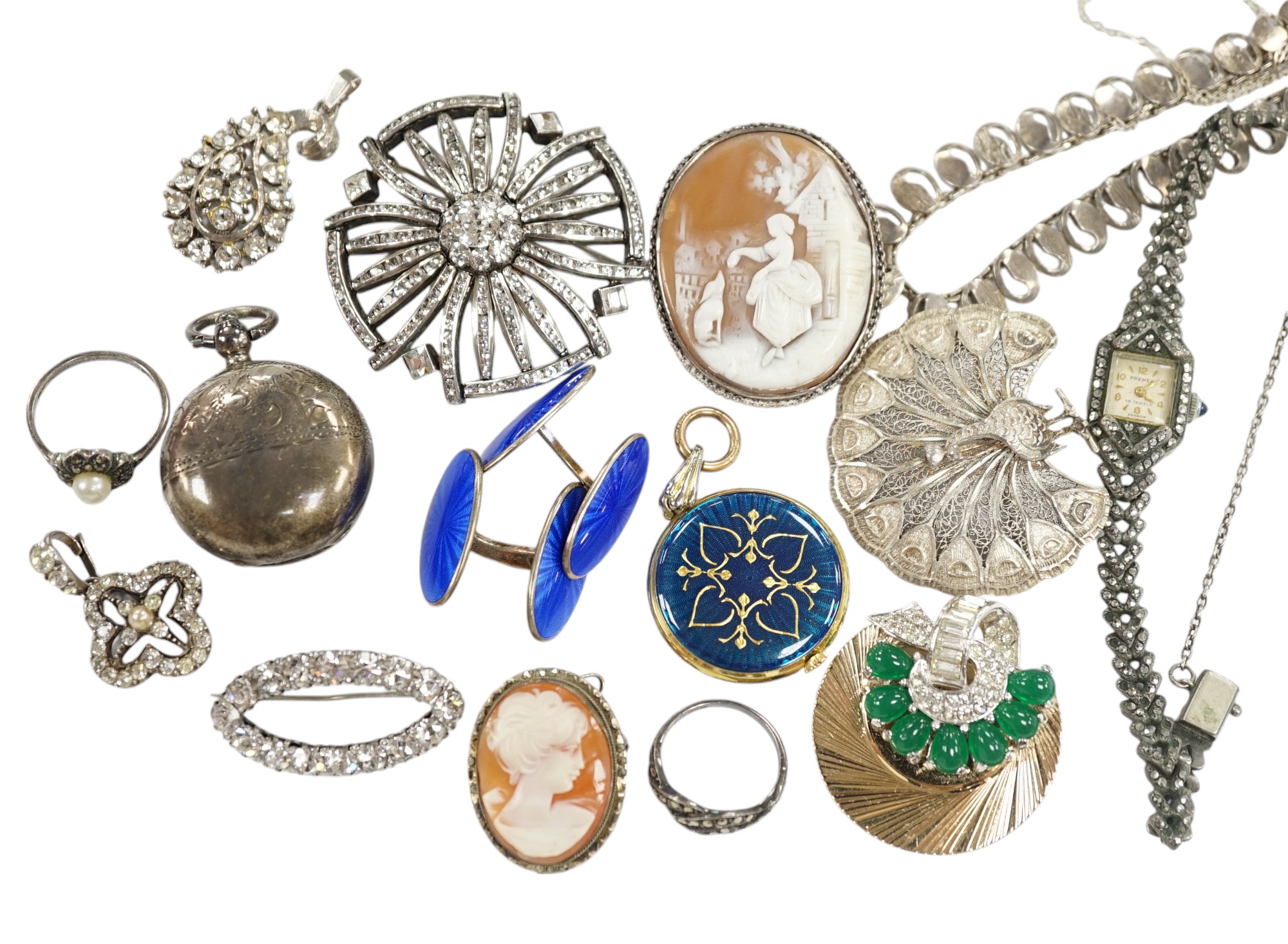 A quantity of assorted costume jewellery, including a garnet set brooch and paste jewellery. Condition - poor to fair